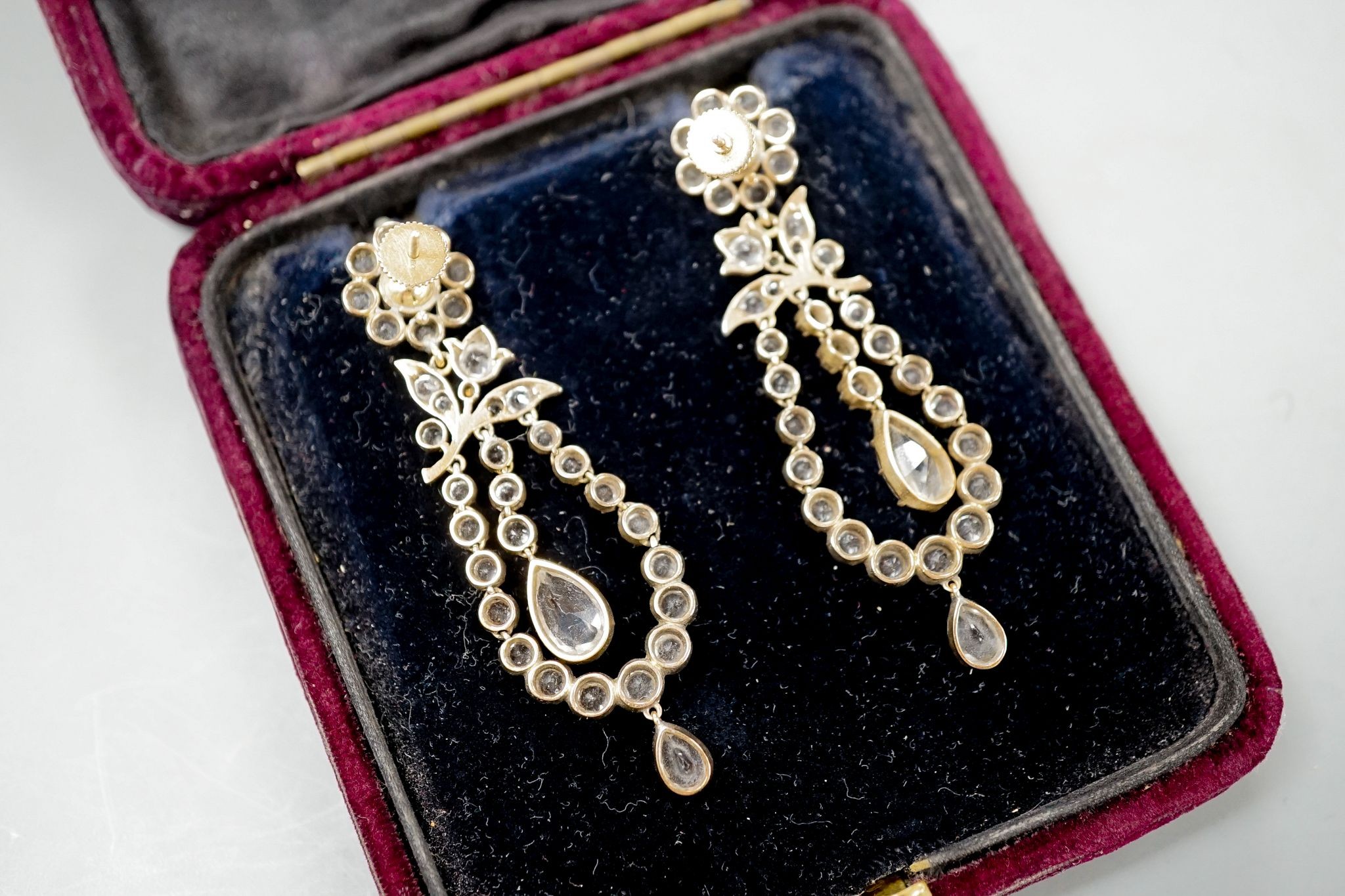 A pair of 19th century yellow and white metal mounted paste set drop earrings, 62mm.